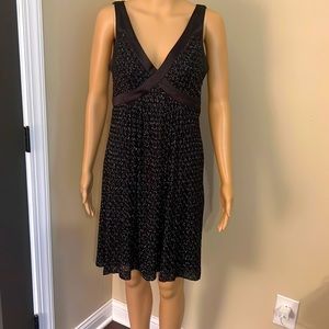 Black/silver metallic-thread sleeveless little black dress.